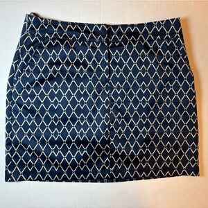 IZOD Golf navy blue geometric diamond print skort size 10 NWOT
